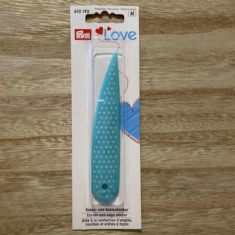 Aide à la confection d'angle, courbes et arêtes à façon bleu