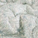 Tissu matelassé double gaze reversible fleurs blanc et marine x10cm